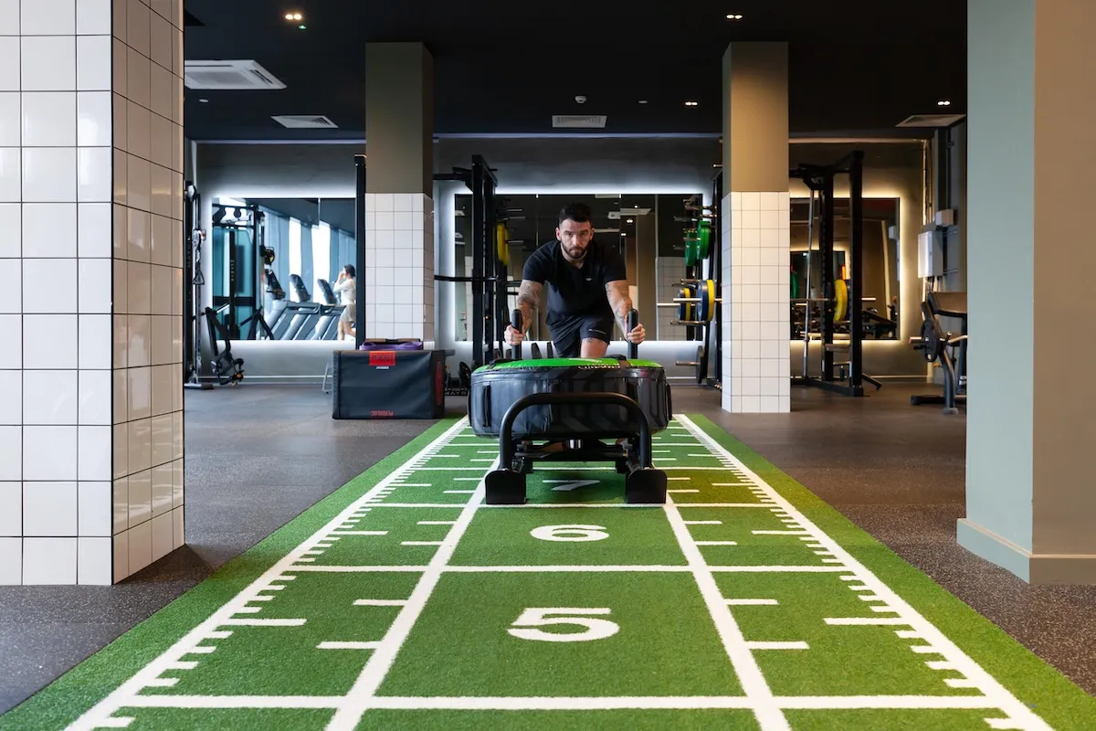 Gym Turf for Sled Training: Problems and Solutions